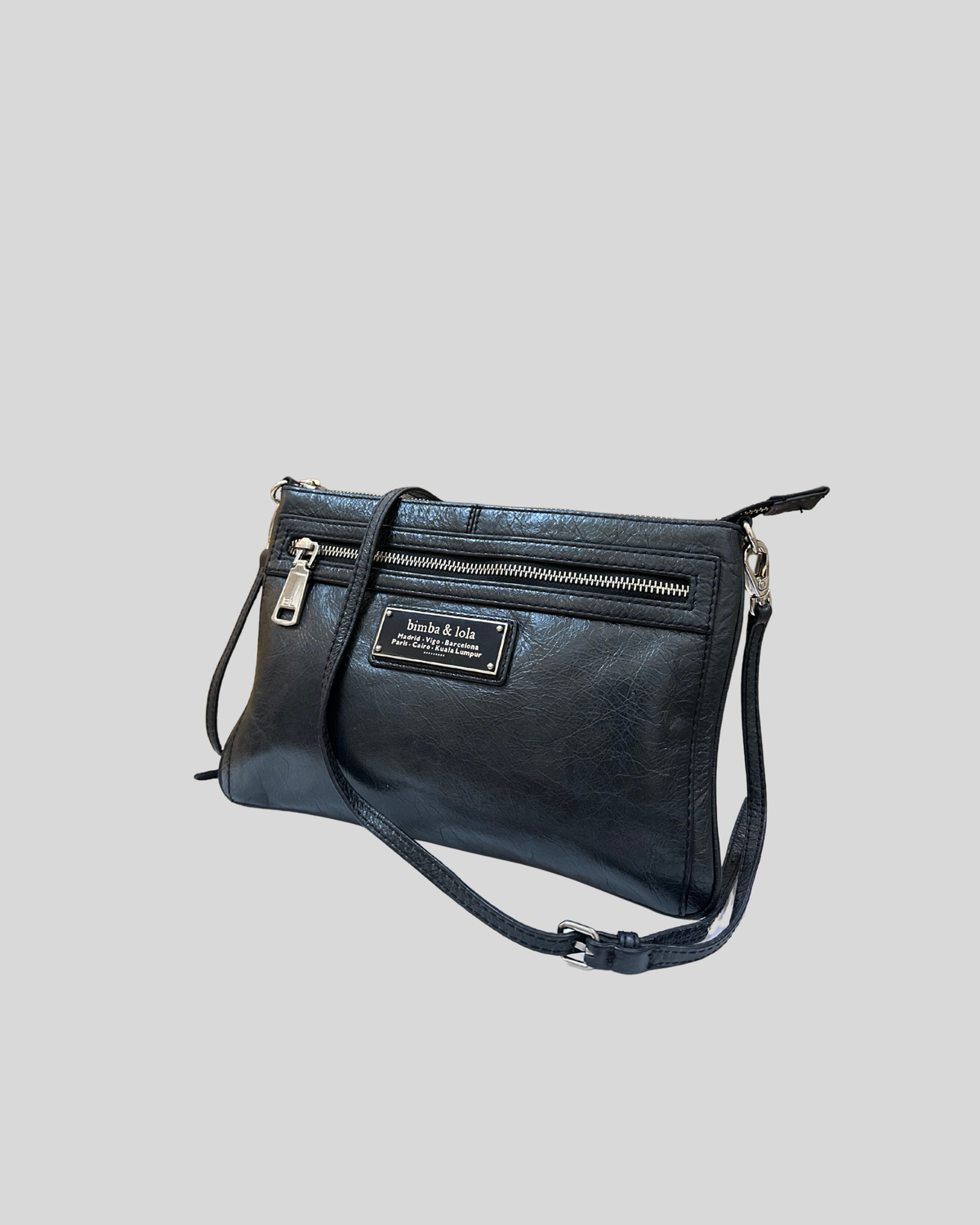🇪🇸 Bimba y Lola – Sac bandoulière noir à plaque logo et poche zippée