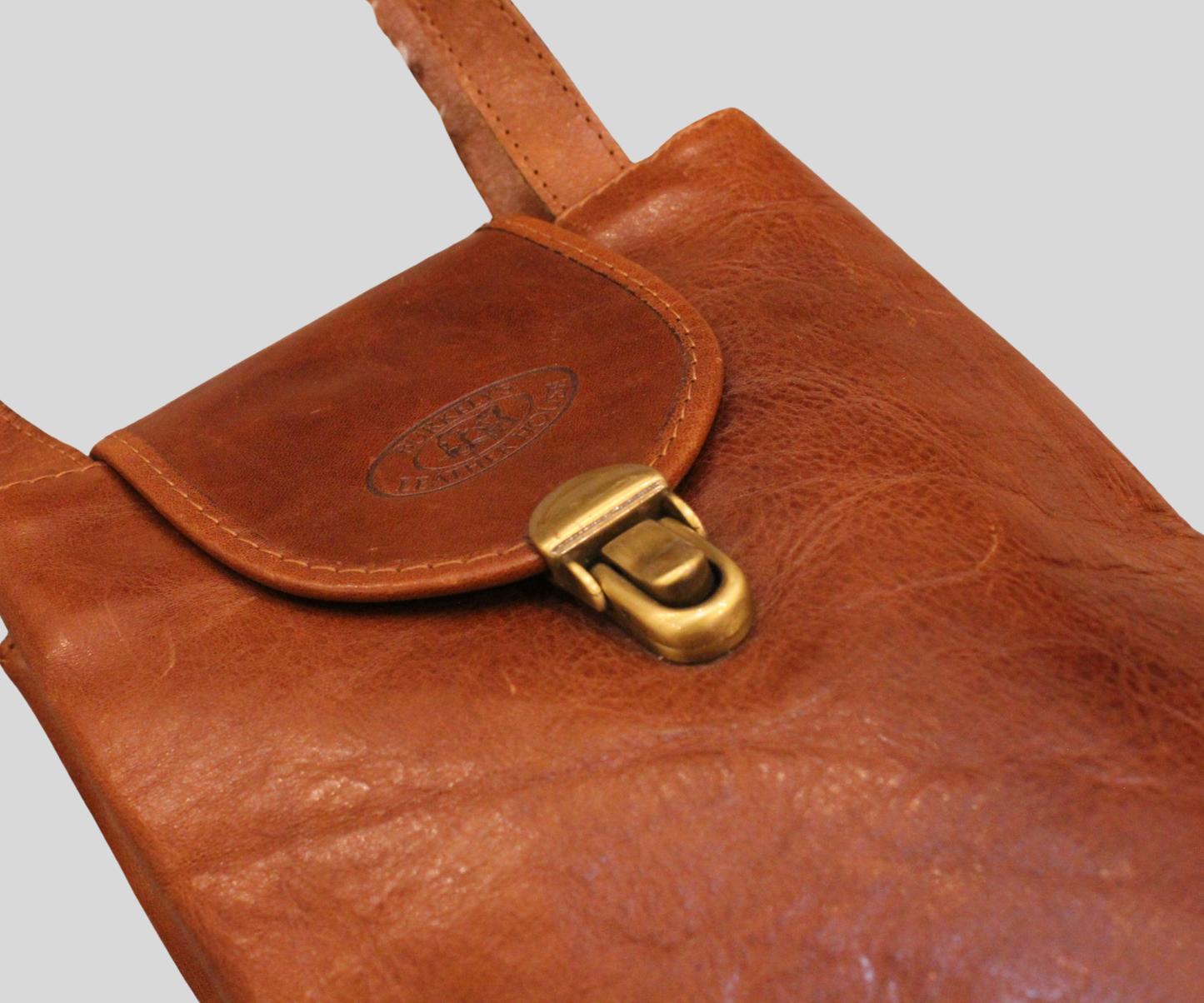 Sac bandoulière Burkelys Leather House cognac en cuir véritable