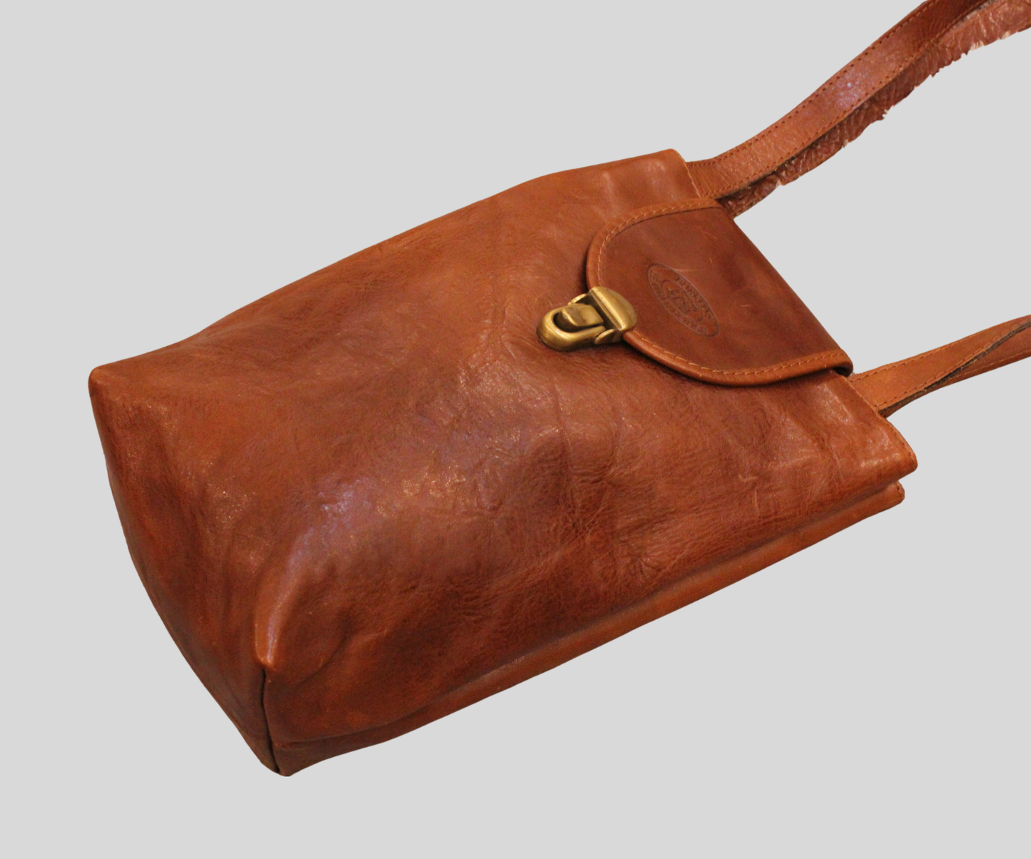 Sac bandoulière Burkelys Leather House cognac en cuir véritable