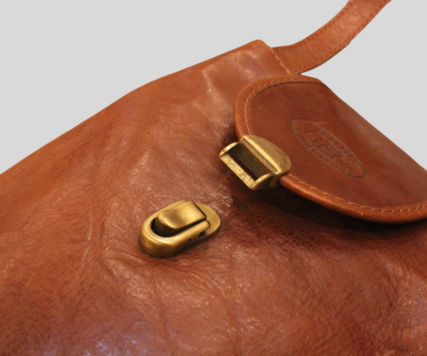 Sac bandoulière Burkelys Leather House cognac en cuir véritable