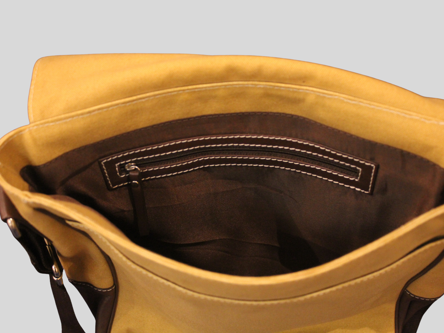 Sac messenger beige et marron en tissu et cuir