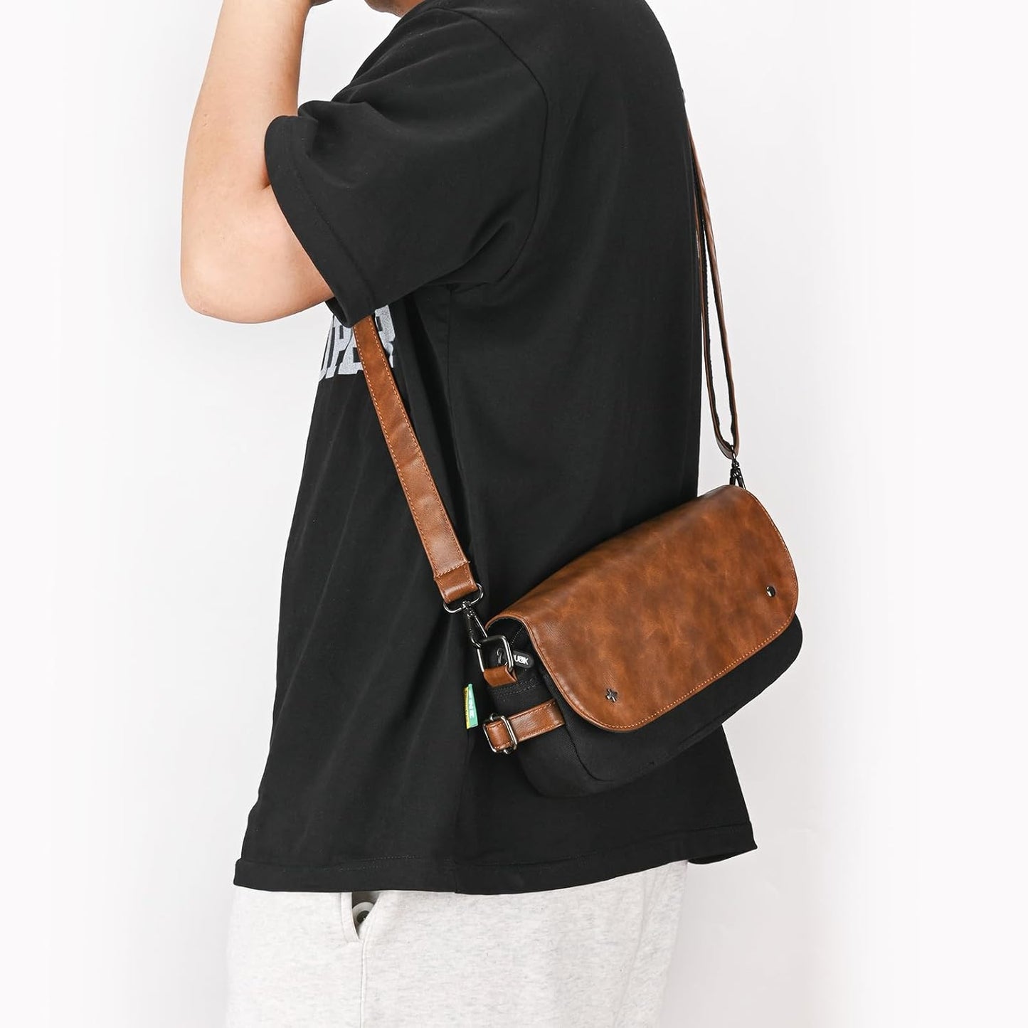 Sac bandoulière Younik marron et noir en cuir et tissu