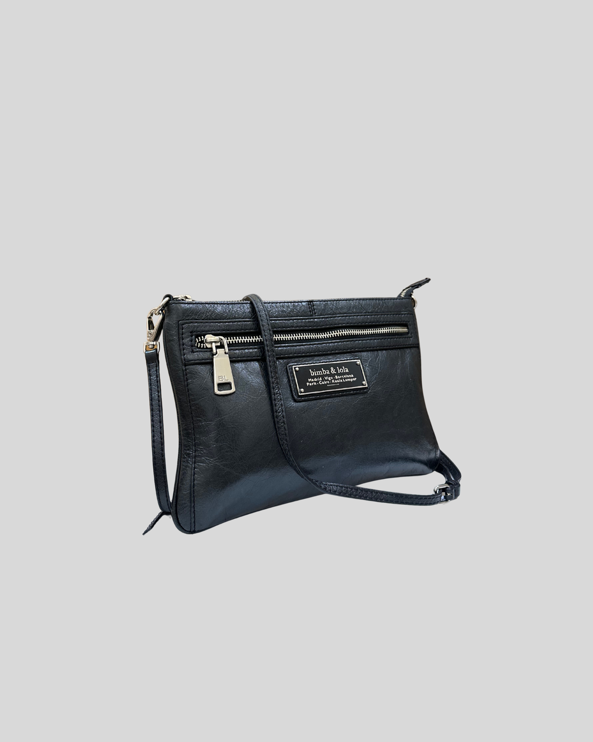🇪🇸 Bimba y Lola – Sac bandoulière noir à plaque logo et poche zippée